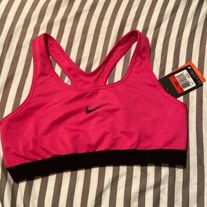 Nike dry fit sports bra. Size large. Pink and black.